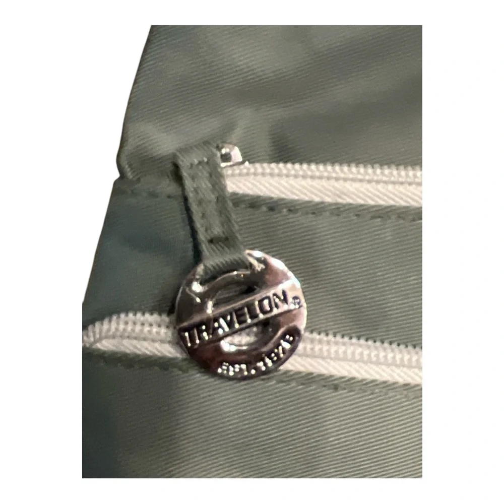 Travelon Anti-theft Crossbody Bag with 7 compartments green.